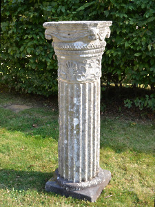 An early 19th century Bath stone column of fluted form 