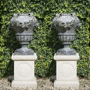 A fine pair of early 20th century lead garden urns