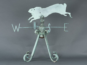 An early 20th century French weathered brass weather vane