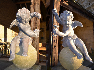 A pair of early 20th century lead Putti