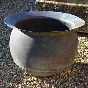 A first stage copper ‘tanners cauldron’ of bulbous form with wide flat rim
