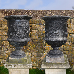 A large pair of 19th century lead urns
