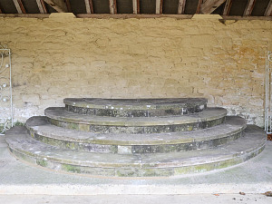 A suite of York stone steps of semi-circular form