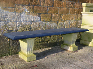 A slate topped garden bench 