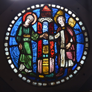 A stained glass panel of 'Joachim and Anna at the Golden Gate'