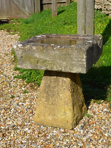 A Cotswold stone birdbath 