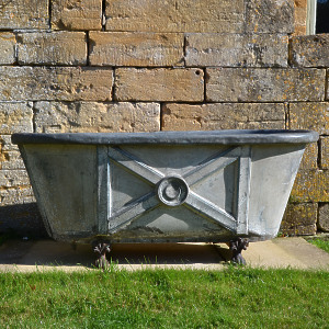 A 19th century painted zinc bath tub