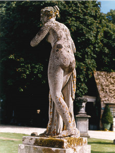 A 19th Century composition stone statue depicting Venus, raised upon a matching pedestal.