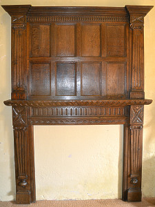 A late 19th century Oak fire surround partially made up from period elements