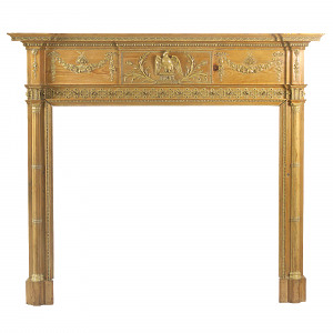 A George III pine and composite fire surround