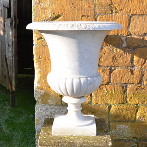 An Italian white marble campana urn