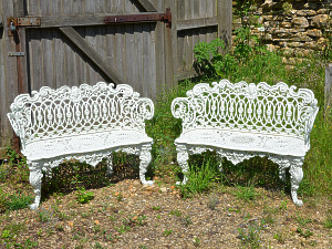 A pair of 19th century cast iron garden seats