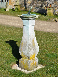 An elegant Georgian Portland stone sundial
