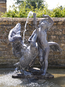 A mid 20th century lead fountain of 'A Boy with Swan' after the model by Theodore Kalide (1801 -1863)
