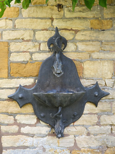 An Arts and Crafts style lead fountain head
