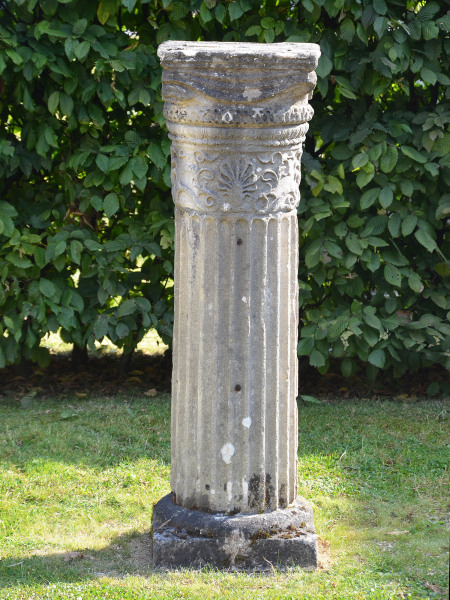 An early 19th century Bath stone column of fluted form