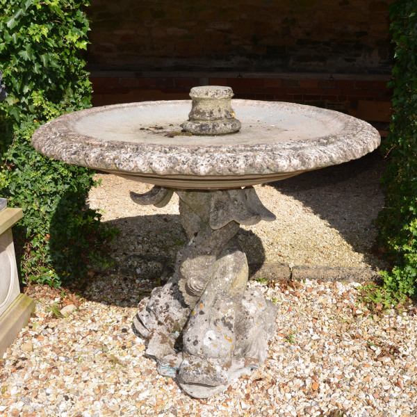 A composition stone fountain base by Austin and Seeley 