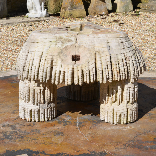 A Coade stone triangular fountain base by Coade