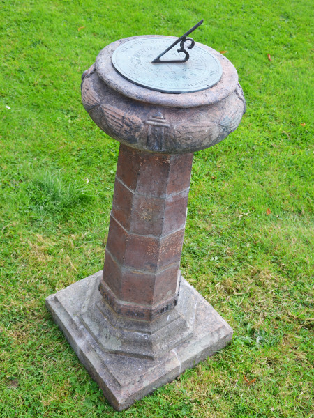An Arts & Crafts terracotta sundial attributed to the Compton Pottery