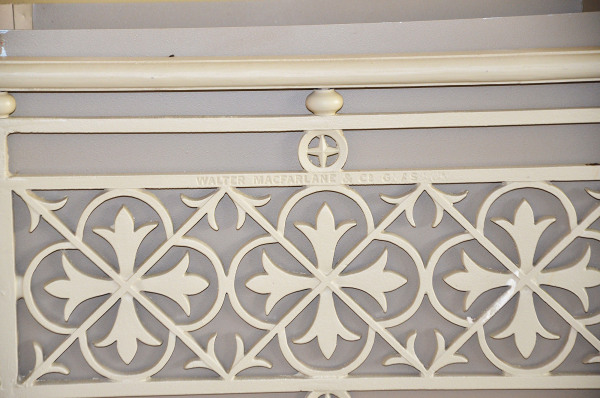 A pair of small cast iron Victorian planters