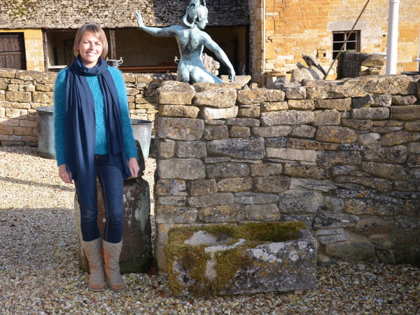 An antique limestone trough with good weathering and patination