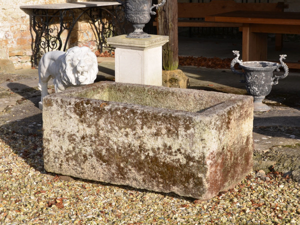 A large antique limestone trough with good weathering and patination