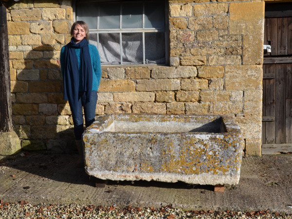 A large antique limestone trough with good weathering and patination