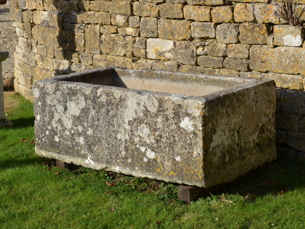 A large antique limestone trough with good weathering and patination