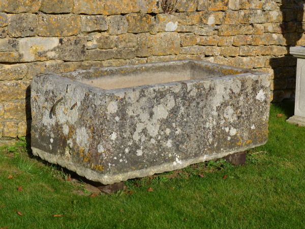 A large antique limestone trough with good weathering and patination