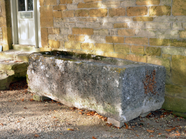A large antique limestone trough with good weathering and patination