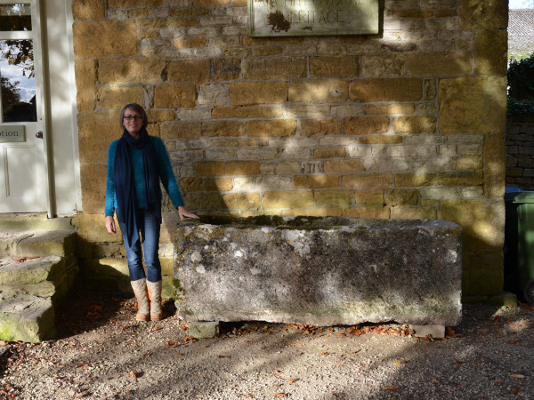 A large antique limestone trough with good weathering and patination