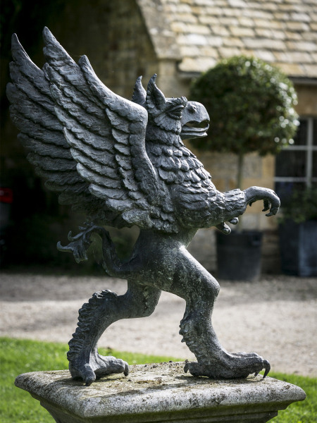 A mighty lost-wax cast bronze Griffin sculpture by John Ravera PPRBS / FRSA (1941-2006)