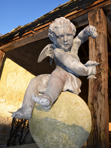 A pair of early 20th century lead Putti