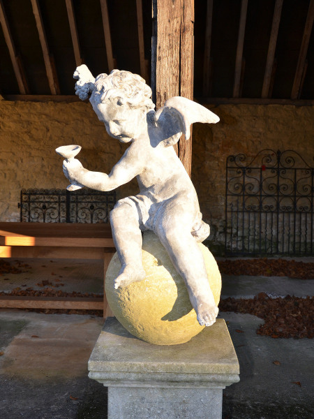 A pair of early 20th century lead Putti