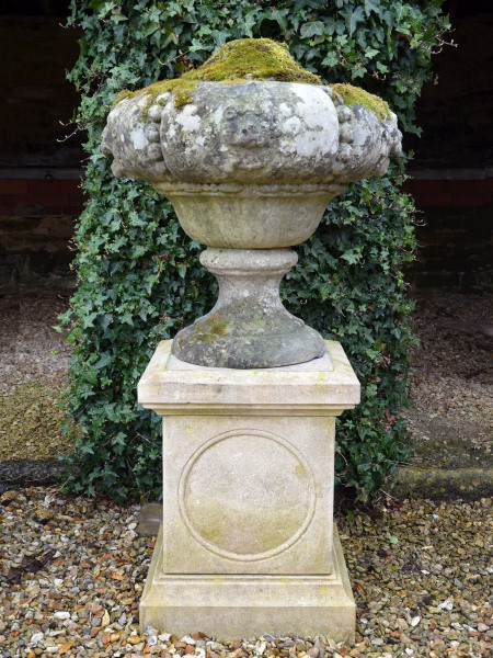 A large pair of late 19th / early 20th century Portland stone finials
