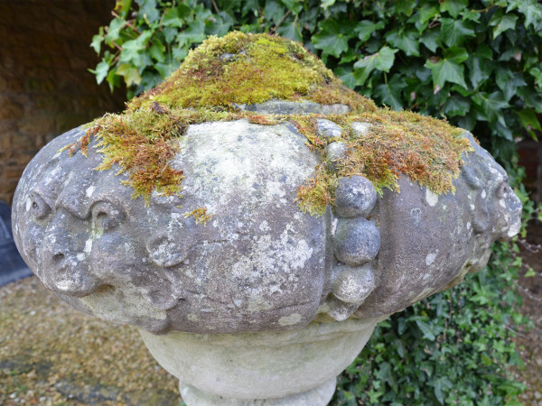 A large pair of late 19th / early 20th century Portland stone finials