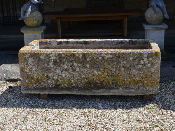 A large and beautifully patinated rectangular stone trough