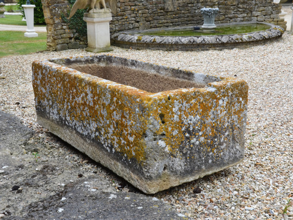 A large and beautifully patinated rectangular stone trough