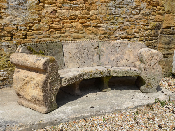 An early 20th century carved Bath stone garden seat 
