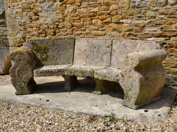An early 20th century carved Bath stone garden seat 