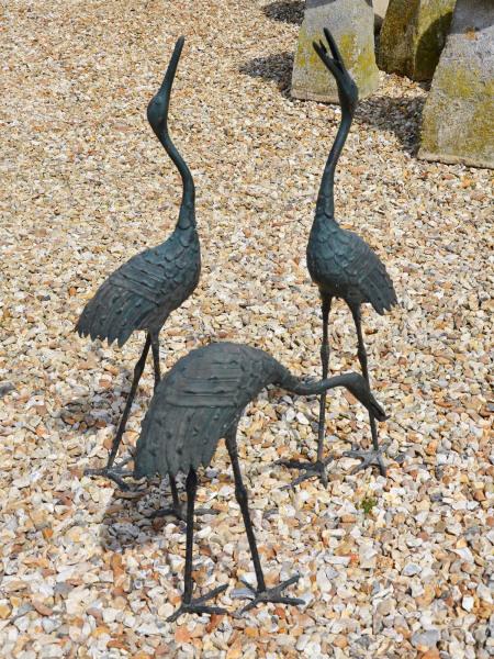 A set of three Taisho period (1912-1926) Japanese bronze cranes