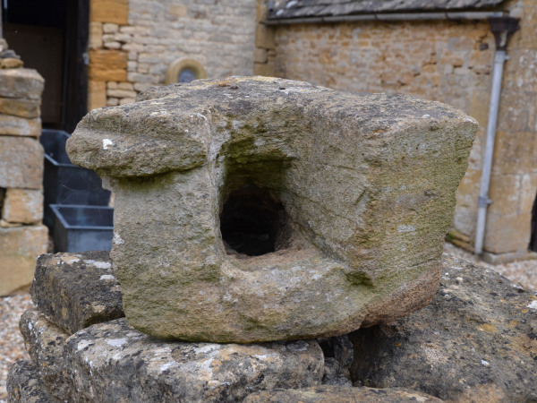 A medieval Ham stone gargoyle in the form of a lion or mythical beast