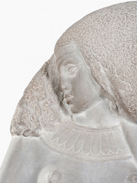 An elegant carved sandstone statue of a young Nubian woman