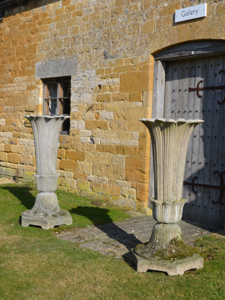 A pair of mid 19th Century composition stone garden vases by Austin and Seeley