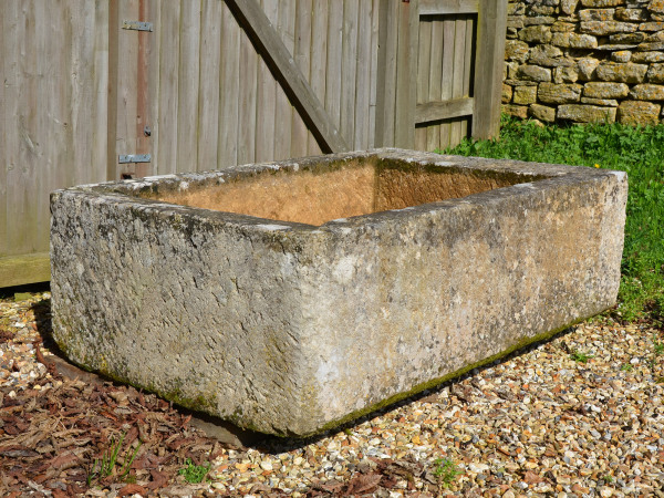 A large antique limestone trough with good weathering and patination