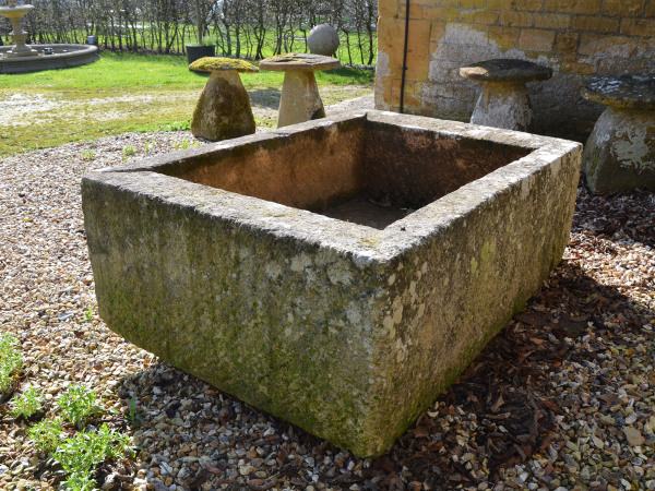 A large antique limestone trough with good weathering and patination