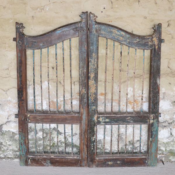 A pair of vintage wood and iron garden gates