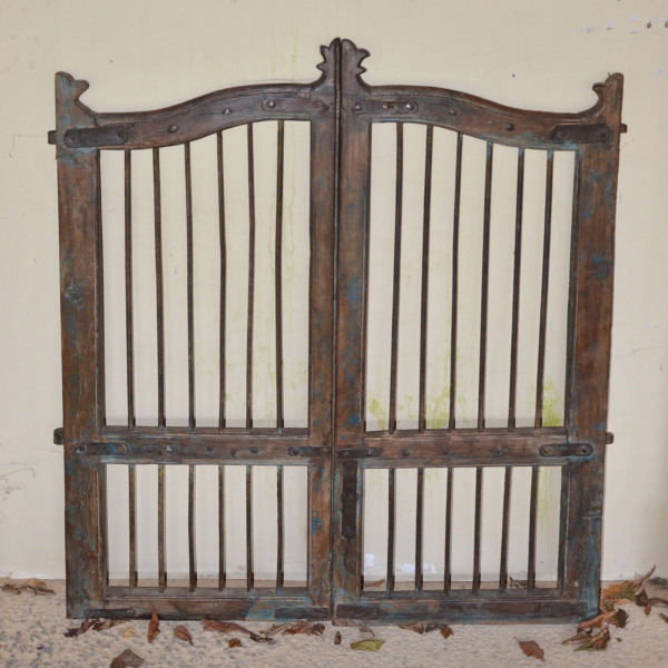A pair of vintage wood and iron garden gates