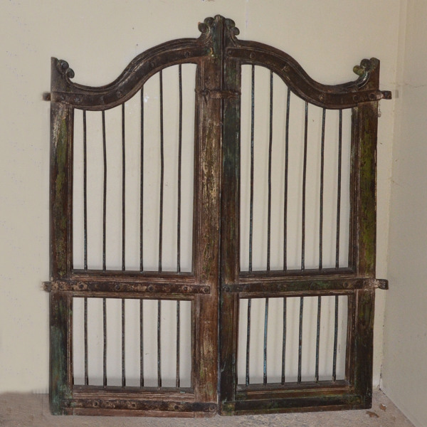 A pair of vintage wood and iron garden gates