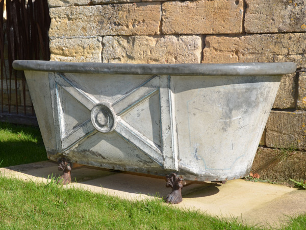 A 19th century painted zinc bath tub